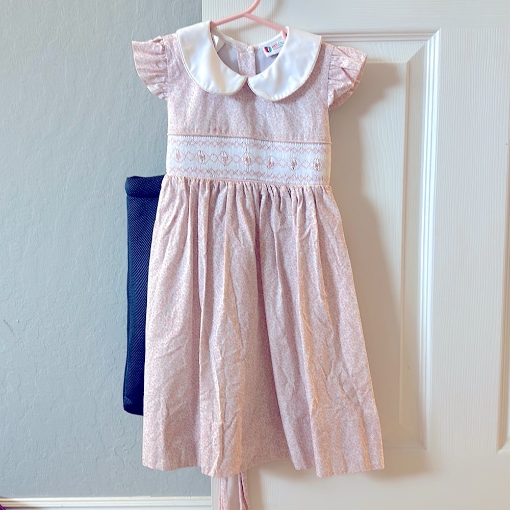 The best dressed child pink and white floral dress.